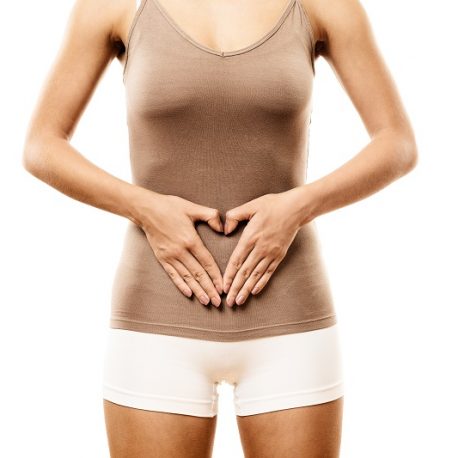 Woman with hands in shape of a heart